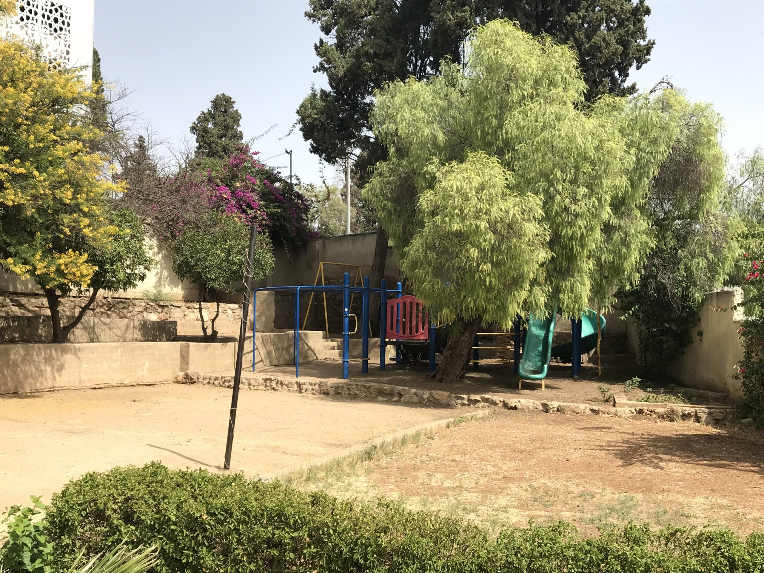 The yard behind the church showing the playground area.