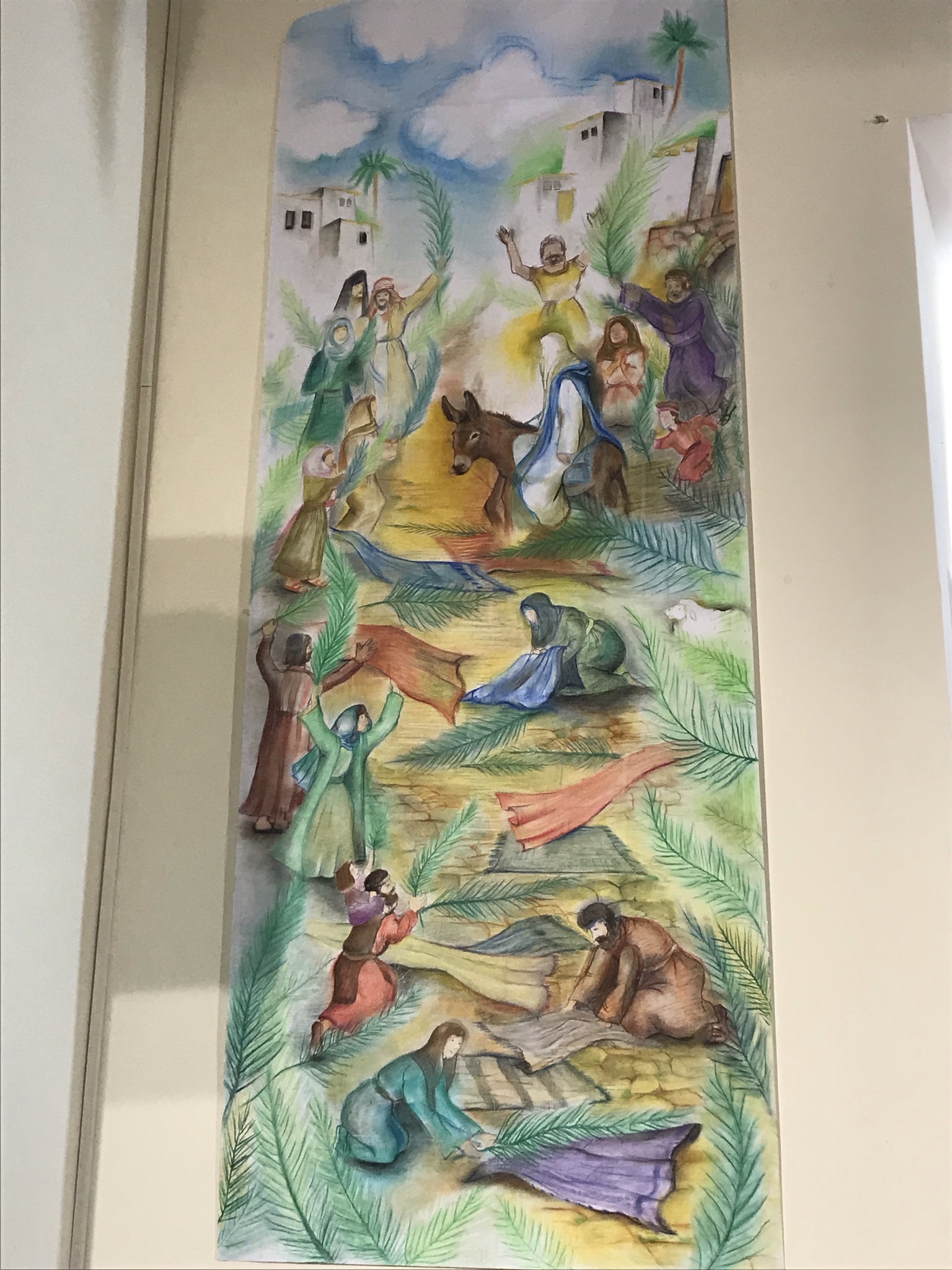 A banner showing the triumphant entry of Christ into Jerusalem.